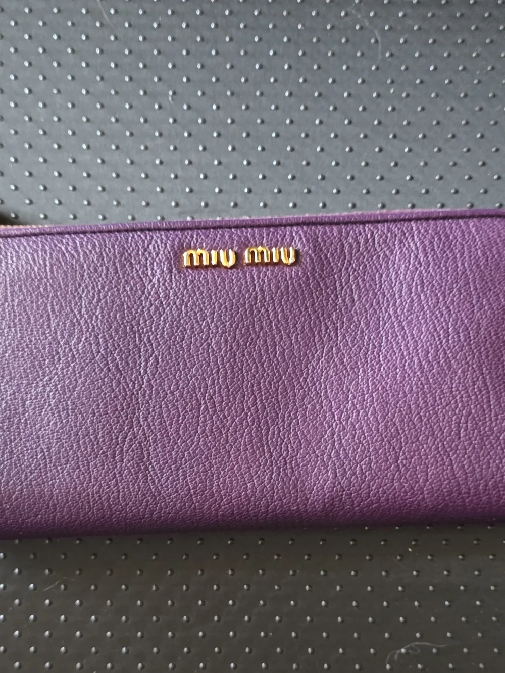 Miu Miu | Bags | Miu Miu Plum Textured Leather Zip Wallet With